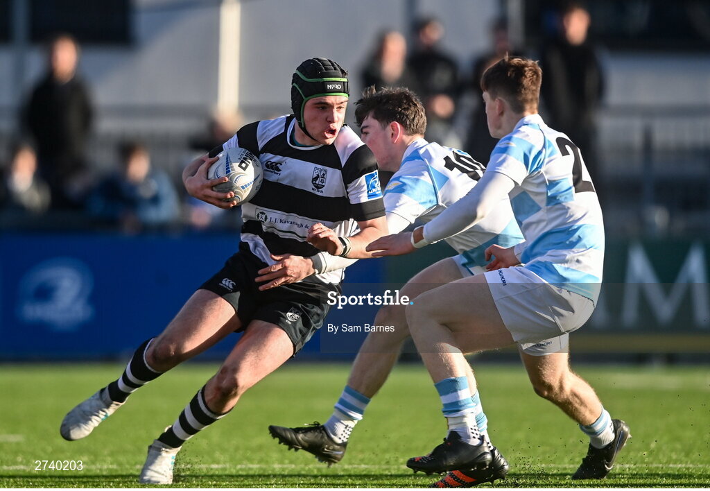 22 February 2024; Evan Brophy of Cistercian College Roscrea in action against Conor O'Shaughnessy and Luke Coffey of Blackrock College during the Bank of Ireland Leinster Schools Senior Cup quarter-final match between Cistercian College, Roscrea and Blackrock College at Energia Park in Dublin. Photo by Sam Barnes/Sportsfile