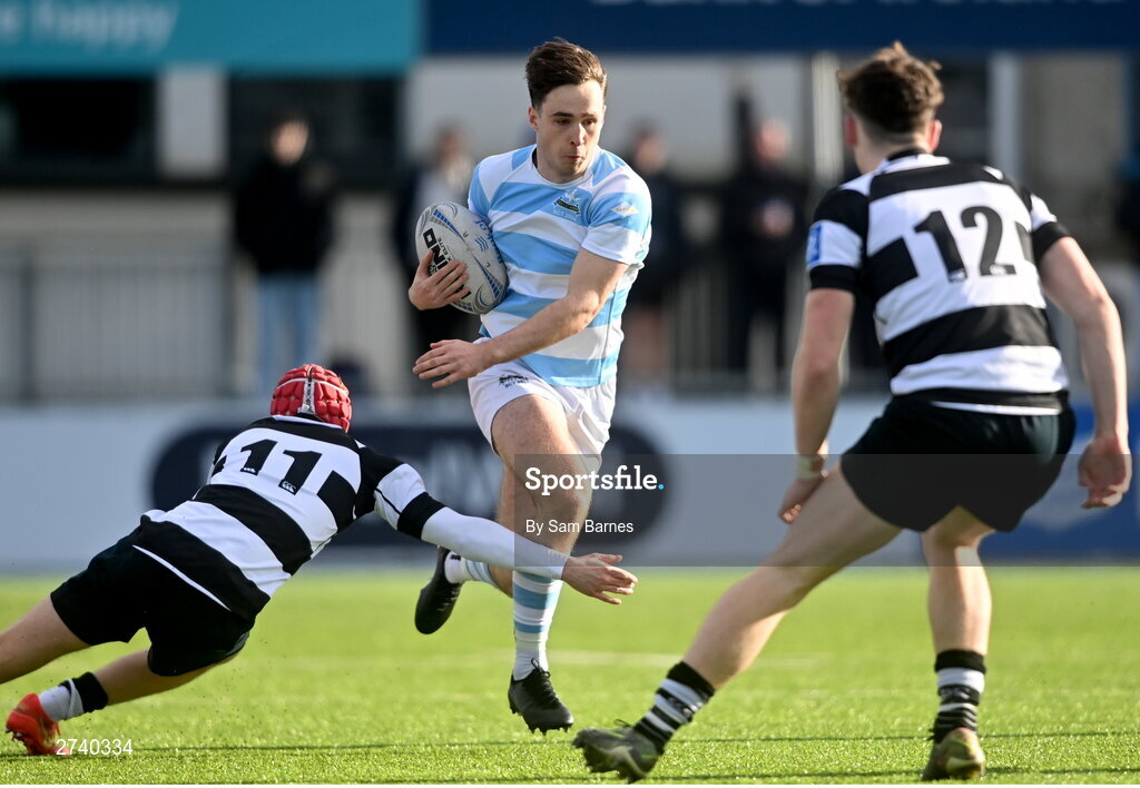 22 February 2024; Derry Moloney of Blackrock College in action against Harry Finlay, left, and Jack Deegan of Cistercian College Roscrea during the Bank of Ireland Leinster Schools Senior Cup quarter-final match between Cistercian College, Roscrea and Blackrock College at Energia Park in Dublin. Photo by Sam Barnes/Sportsfile