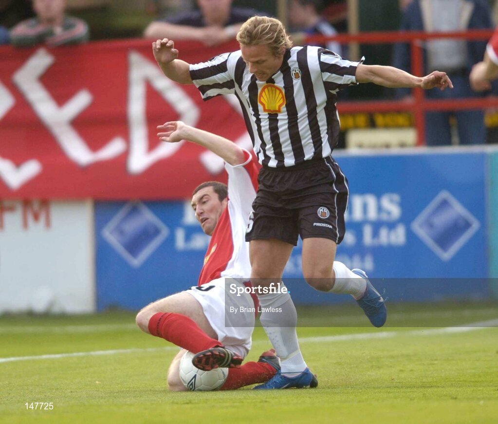 21 July 2004; Jason Byrne, Shelbourne, in action against Kristian Orn Sigurdsson, KR Reykjavik. UEFA Champions League 1st Qualifying Round, Second Leg, Shelbourne v KR Reykjavik, Tolka Park, Dublin. Picture credit; Brian Lawless / SPORTSFILE