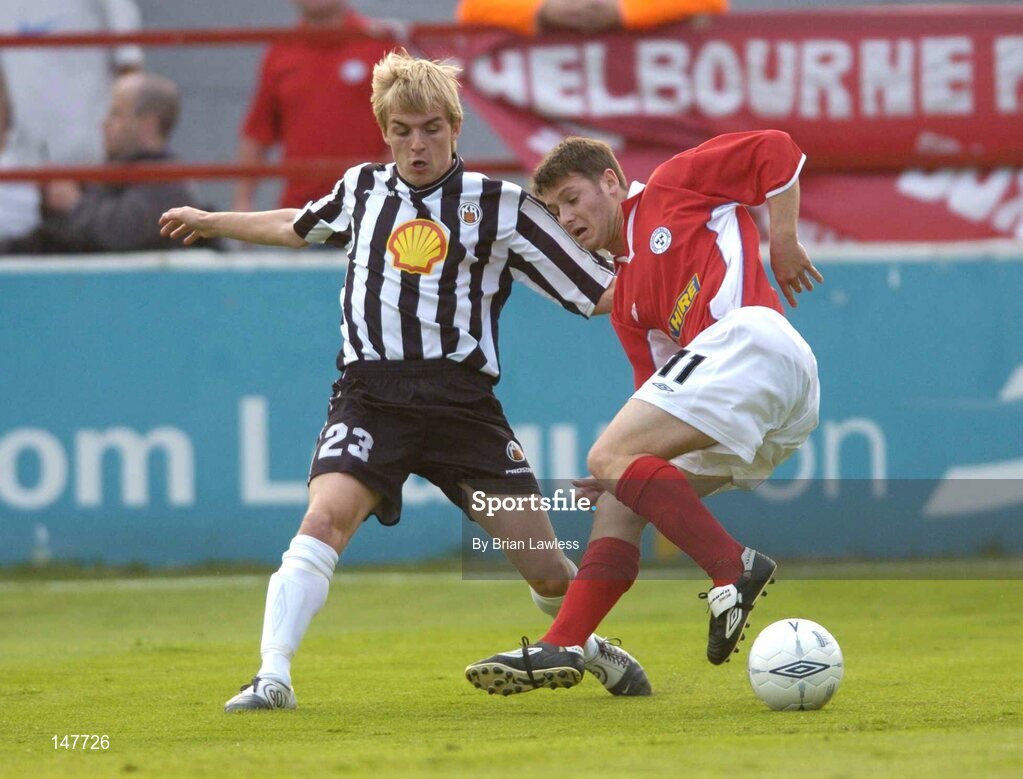 21 July 2004; Wesley Hoolihan, Shelbourne, in action against Jokull Elisarbetarson, KR Reykjavik. UEFA Champions League 1st Qualifying Round, Second Leg, Shelbourne v KR Reykjavik, Tolka Park, Dublin. Picture credit; Brian Lawless / SPORTSFILE