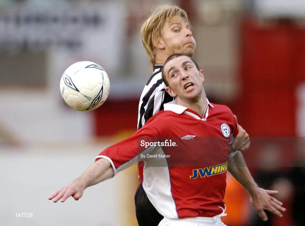 21 July 2004; Owen Heary, Shelbourne, in action against Thor Agust Gylfason, KR Reykjavik. UEFA Champions League 1st Qualifying Round, Second Leg, Shelbourne v KR Reykjavik, Tolka Park, Dublin. Picture credit; David Maher / SPORTSFILE