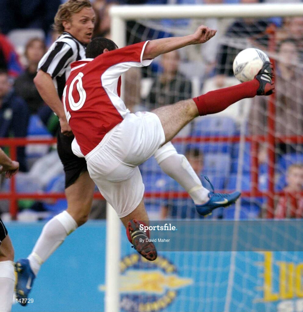 21 July 2004; Jason Byrne, Shelbourne, in action against Kristjan Sigurosson, KR Reykjavik. UEFA Champions League 1st Qualifying Round, Second Leg, Shelbourne v KR Reykjavik, Tolka Park, Dublin. Picture credit; David Maher / SPORTSFILE