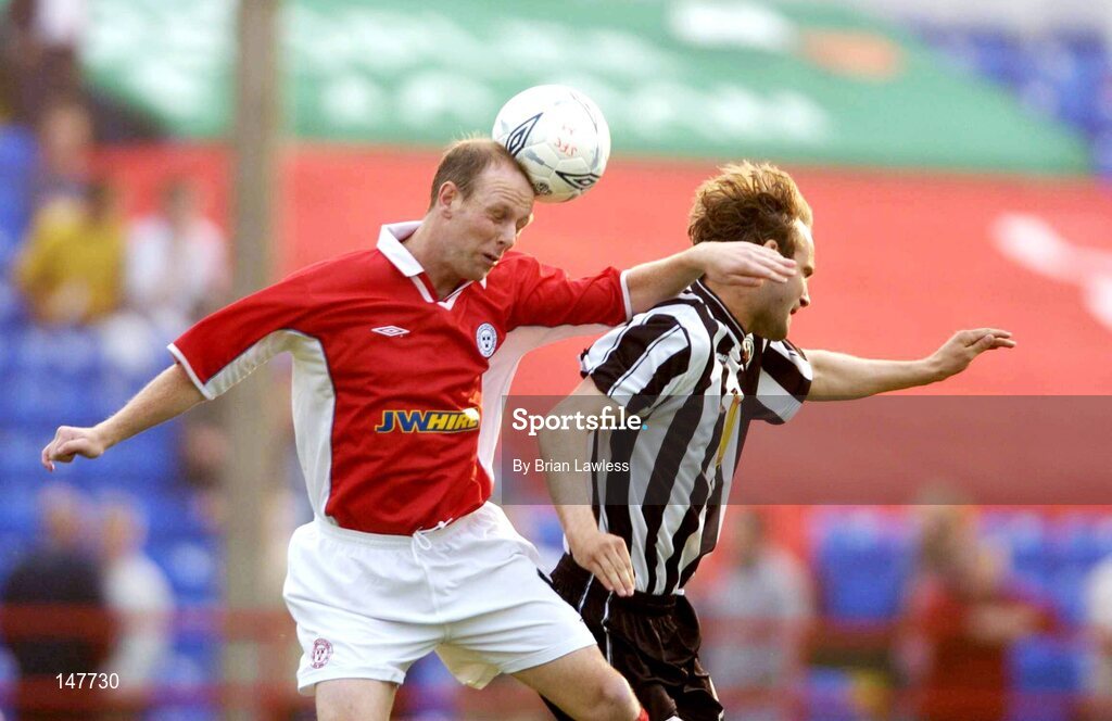 21 July 2004; Thomas Morgan, Shelbourne, in action against Sigurvan Olafsson, KR Reykjavik. UEFA Champions League 1st Qualifying Round, Second Leg, Shelbourne v KR Reykjavik, Tolka Park, Dublin. Picture credit; Brian Lawless / SPORTSFILE