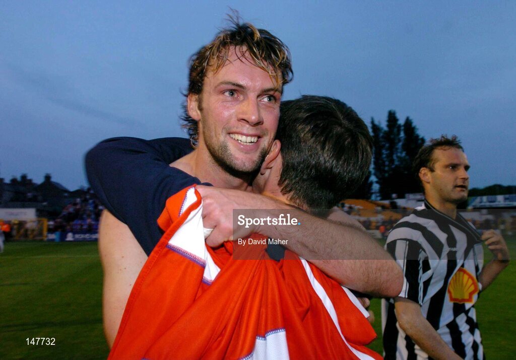 21 July 2004; Jamie Harris, Shelbourne, celebrates with his manager Pat Fenlon at the end of the game after victory over KR Reykjavik. UEFA Champions League 1st Qualifying Round, Second Leg, Shelbourne v KR Reykjavik, Tolka Park, Dublin. Picture credit; David Maher / SPORTSFILE