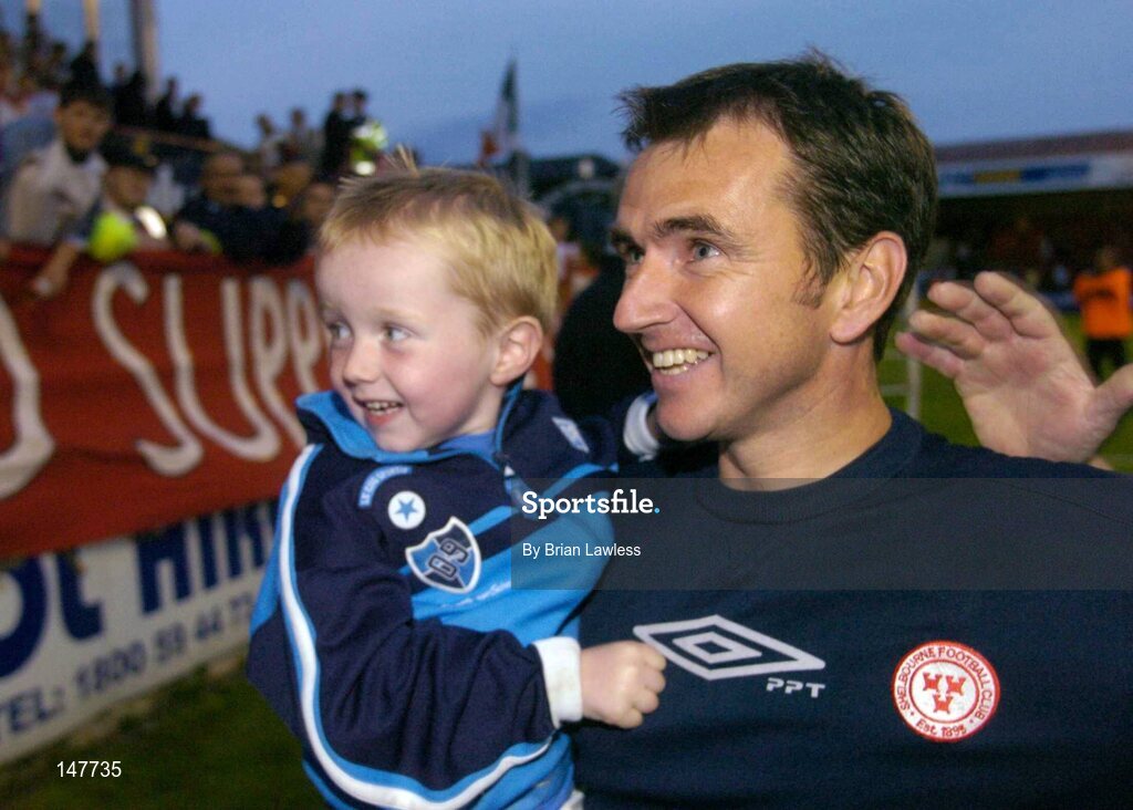21 July 2004; Shelbourne manager Pat Fenlon with his son Pearse after victory over KR Reykjavik. UEFA Champions League 1st Qualifying Round, Second Leg, Shelbourne v KR Reykjavik, Tolka Park, Dublin. Picture credit; Brian Lawless / SPORTSFILE