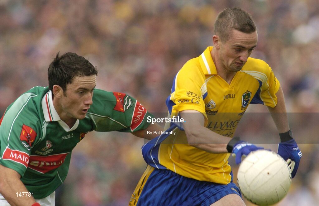 18 July 2004; Jonathon Dunning, Roscommon, in action against Conor Moran, Mayo. Bank of Ireland Connacht Senior Football Championship Final, Mayo v Roscommon, McHale Park, Castlebar, Co. Mayo. Picture credit; Pat Murphy / SPORTSFILE