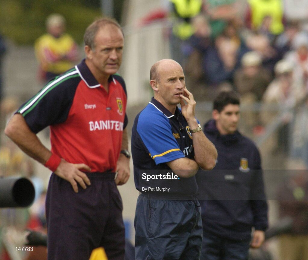 18 July 2004; Tommy Carr, Roscommon manager, and Mayo manager John Maughan, left, watch on during the final moments of the game. Bank of Ireland Connacht Senior Football Championship Final, Mayo v Roscommon, McHale Park, Castlebar, Co. Mayo. Picture credit; Pat Murphy / SPORTSFILE