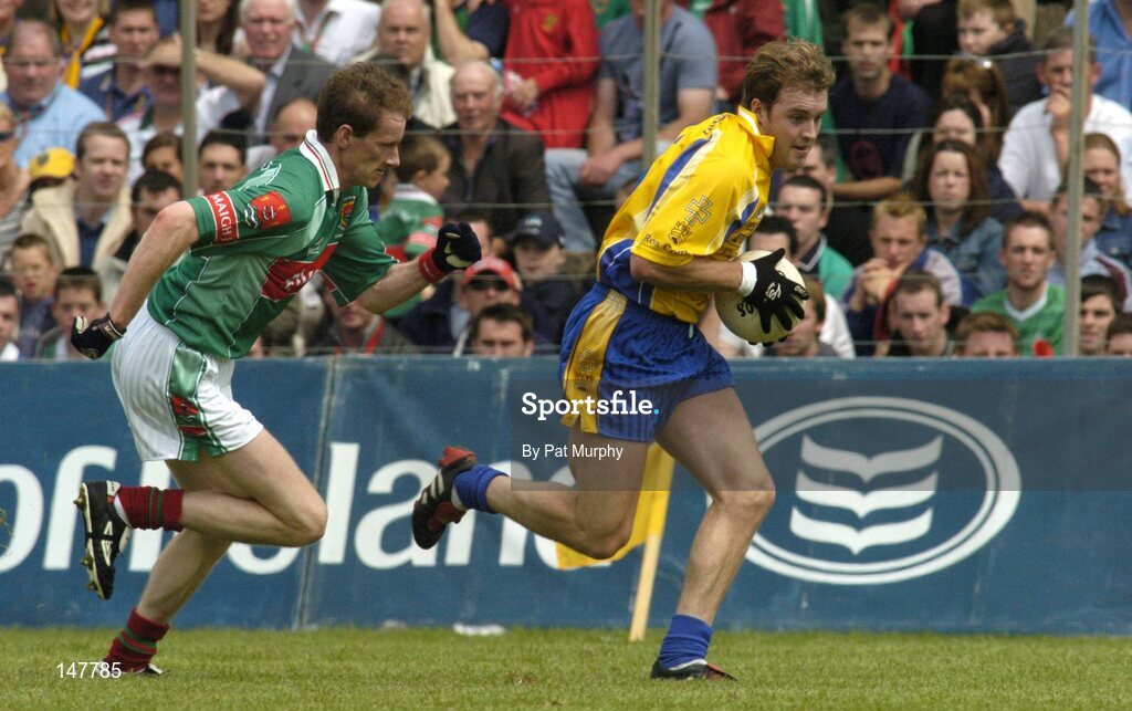 18 July 2004; David Casey, Roscommon, in action against James Nallen, Mayo. Bank of Ireland Connacht Senior Football Championship Final, Mayo v Roscommon, McHale Park, Castlebar, Co. Mayo. Picture credit; Pat Murphy / SPORTSFILE