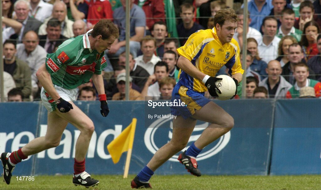 18 July 2004; David Casey, Roscommon, in action against James Nallen, Mayo. Bank of Ireland Connacht Senior Football Championship Final, Mayo v Roscommon, McHale Park, Castlebar, Co. Mayo. Picture credit; Pat Murphy / SPORTSFILE