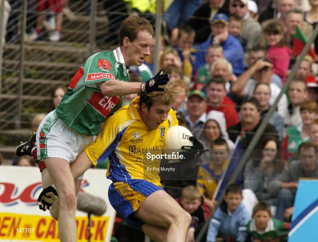 18 July 2004; David Casey, Roscommon, in action against James Nallen, Mayo. Bank of Ireland Connacht Senior Football Championship Final, Mayo v Roscommon, McHale Park, Castlebar, Co. Mayo. Picture credit; Pat Murphy / SPORTSFILE