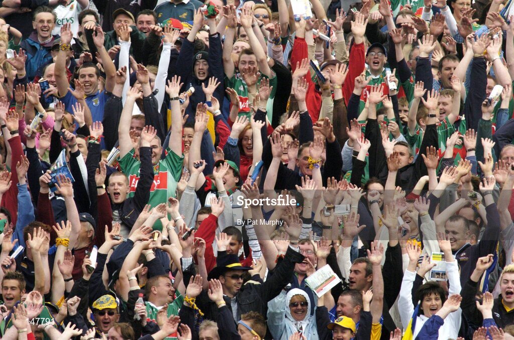 18 July 2004; Mayo and Roscommon fans cheer on their sides during the game. Bank of Ireland Connacht Senior Football Championship Final, Mayo v Roscommon, McHale Park, Castlebar, Co. Mayo. Picture credit; Pat Murphy / SPORTSFILE