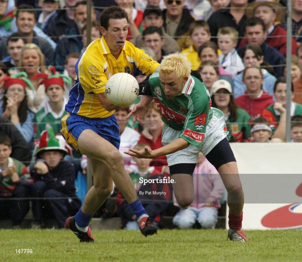 18 July 2004; Conor Mortimer, Mayo, in action against John Whyte, Roscommon. Bank of Ireland Connacht Senior Football Championship Final, Mayo v Roscommon, McHale Park, Castlebar, Co. Mayo. Picture credit; Pat Murphy / SPORTSFILE