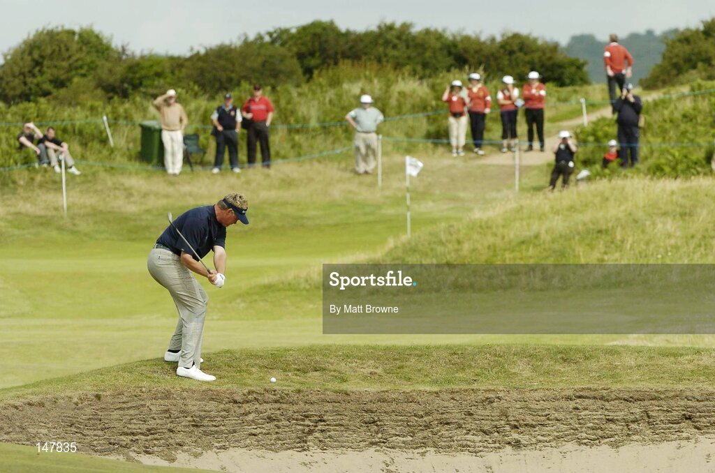 21 July 2004; Darren Clarke plays his second shot to the 16th green during the first round. Nissan Irish Open Golf Championship, County Louth Golf Club, Baltray, Co. Louth. Picture credit; Matt Browne / SPORTSFILE