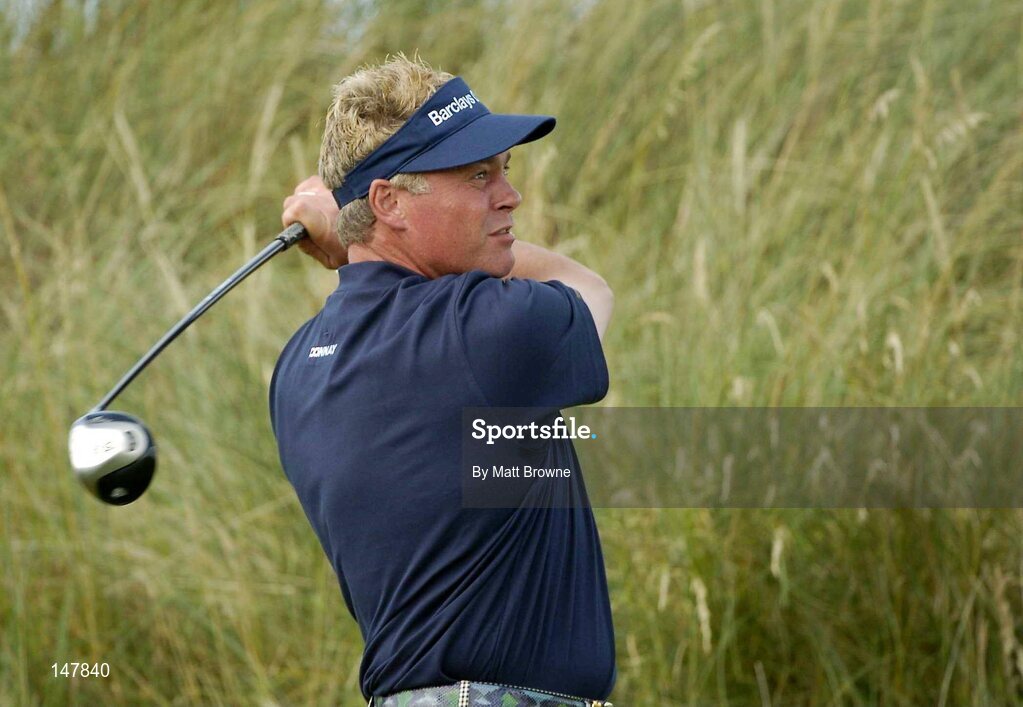 21 July 2004; Darren Clarke watches his drive from the 12th tee box during the first round. Nissan Irish Open Golf Championship, County Louth Golf Club, Baltray, Co. Louth. Picture credit; Matt Browne / SPORTSFILE