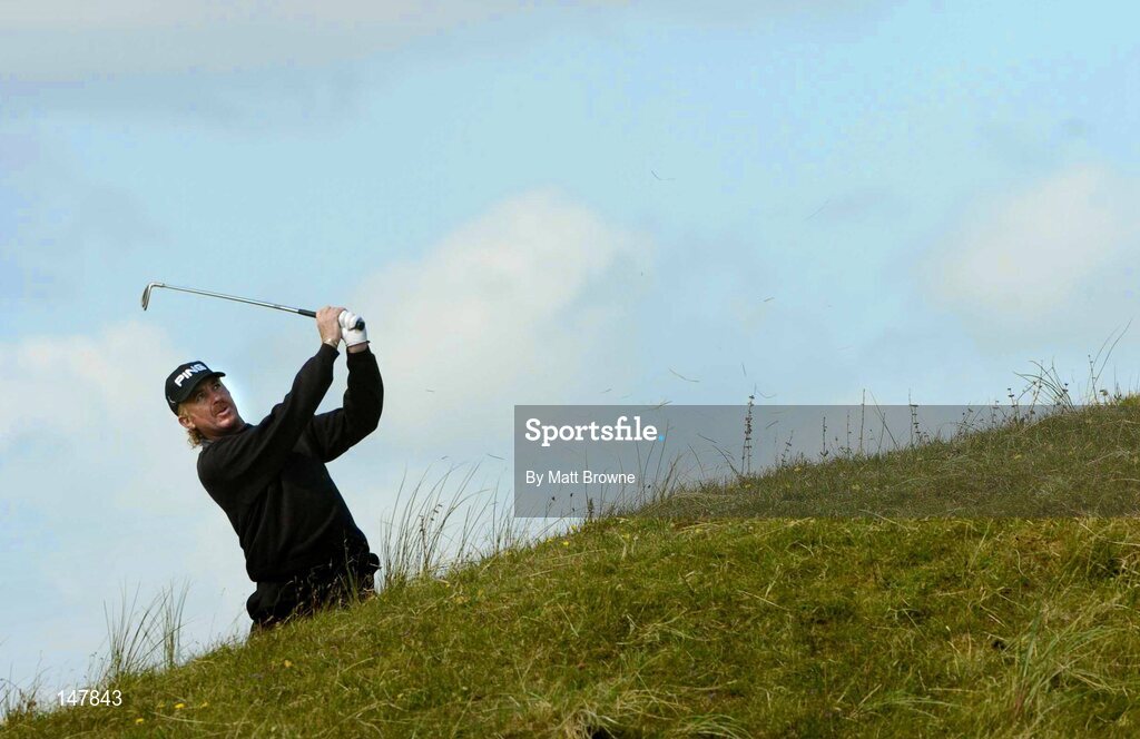 21 July 2004; Miguel Angel Jimenez plays from the rough onto the 12th green during the first round. Nissan Irish Open Golf Championship, County Louth Golf Club, Baltray, Co. Louth. Picture credit; Matt Browne / SPORTSFILE