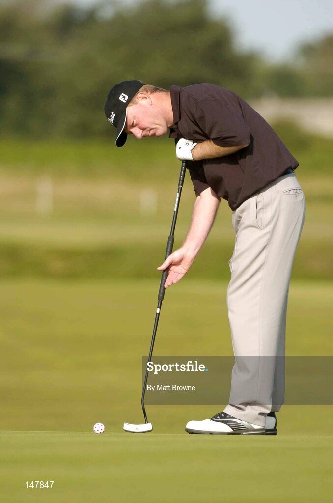 21 July 2004; Philip Walton watches his putt on the 2nd green during the first round. Nissan Irish Open Golf Championship, County Louth Golf Club, Baltray, Co. Louth. Picture credit; Matt Browne / SPORTSFILE