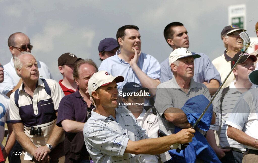 21 July 2004; Padraig Harrington watches his second shot from the 4th fairway during the first round. Nissan Irish Open Golf Championship, County Louth Golf Club, Baltray, Co. Louth. Picture credit; Matt Browne / SPORTSFILE