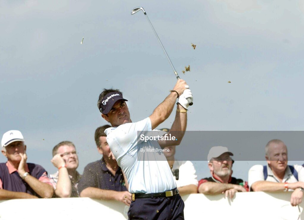 21 July 2004; Paul McGinley watches his tee shot from the 5th tee box during the first round. Nissan Irish Open Golf Championship, County Louth Golf Club, Baltray, Co. Louth. Picture credit; Matt Browne / SPORTSFILE