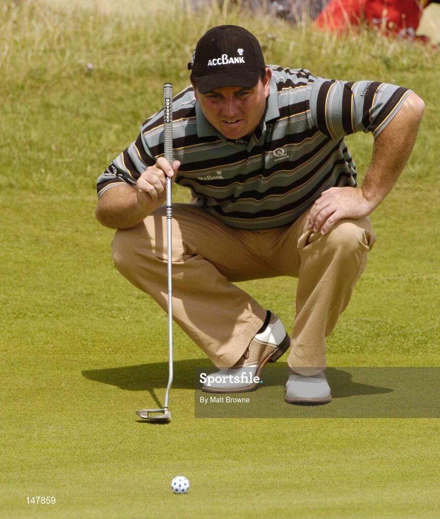 21 July 2004; Gary Murphy lines up a putt on the 2nd green  during the first round. Nissan Irish Open Golf Championship, County Louth Golf Club, Baltray, Co. Louth. Picture credit; Matt Browne / SPORTSFILE