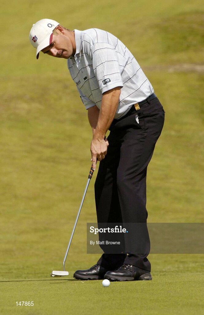 21 July 2004; Padraig Harrington watches his putt on the 3rd green  during the first round. Nissan Irish Open Golf Championship, County Louth Golf Club, Baltray, Co. Louth. Picture credit; Matt Browne / SPORTSFILE