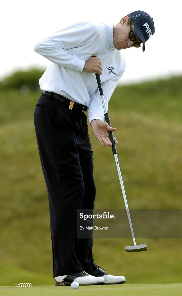 21 July 2004; Nick O'Hern watches his putt on the 6th green  during the first round. Nissan Irish Open Golf Championship, County Louth Golf Club, Baltray, Co. Louth. Picture credit; Matt Browne / SPORTSFILE