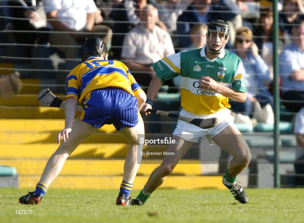 17 July 2004; Rory Hanniffy, Offaly, in action against Frank Lohan, Clare. Guinness Senior Hurling Championship Qualifier, Round 3, Clare v Offaly, Gaelic Grounds, Limerick. Picture credit; Brendan Moran / SPORTSFILE