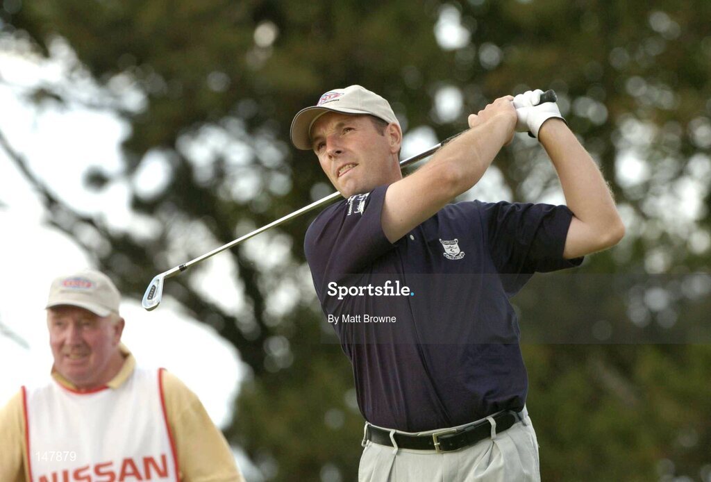 21 July 2004; David Higgins watches his tee shot from the 17th tee box during the first round. Nissan Irish Open Golf Championship, County Louth Golf Club, Baltray, Co. Louth. Picture credit; Matt Browne / SPORTSFILE