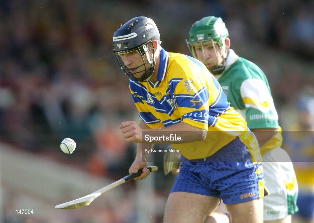 17 July 2004; Tony Carmody, Clare, in action against Barry Teehan, Offaly. Guinness Senior Hurling Championship Qualifier, Round 3, Clare v Offaly, Gaelic Grounds, Limerick. Picture credit; Brendan Moran / SPORTSFILE