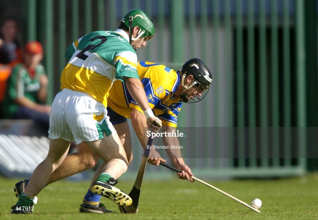 17 July 2004; Tony Carmody, Clare, in action against Barry Teehan, Offaly. Guinness Senior Hurling Championship Qualifier, Round 3, Clare v Offaly, Gaelic Grounds, Limerick. Picture credit; Brendan Moran / SPORTSFILE