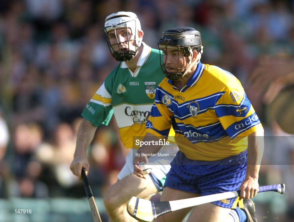 17 July 2004; David Forde, Clare, in action against Kevin Brady, Offaly. Guinness Senior Hurling Championship Qualifier, Round 3, Clare v Offaly, Gaelic Grounds, Limerick. Picture credit; Brendan Moran / SPORTSFILE