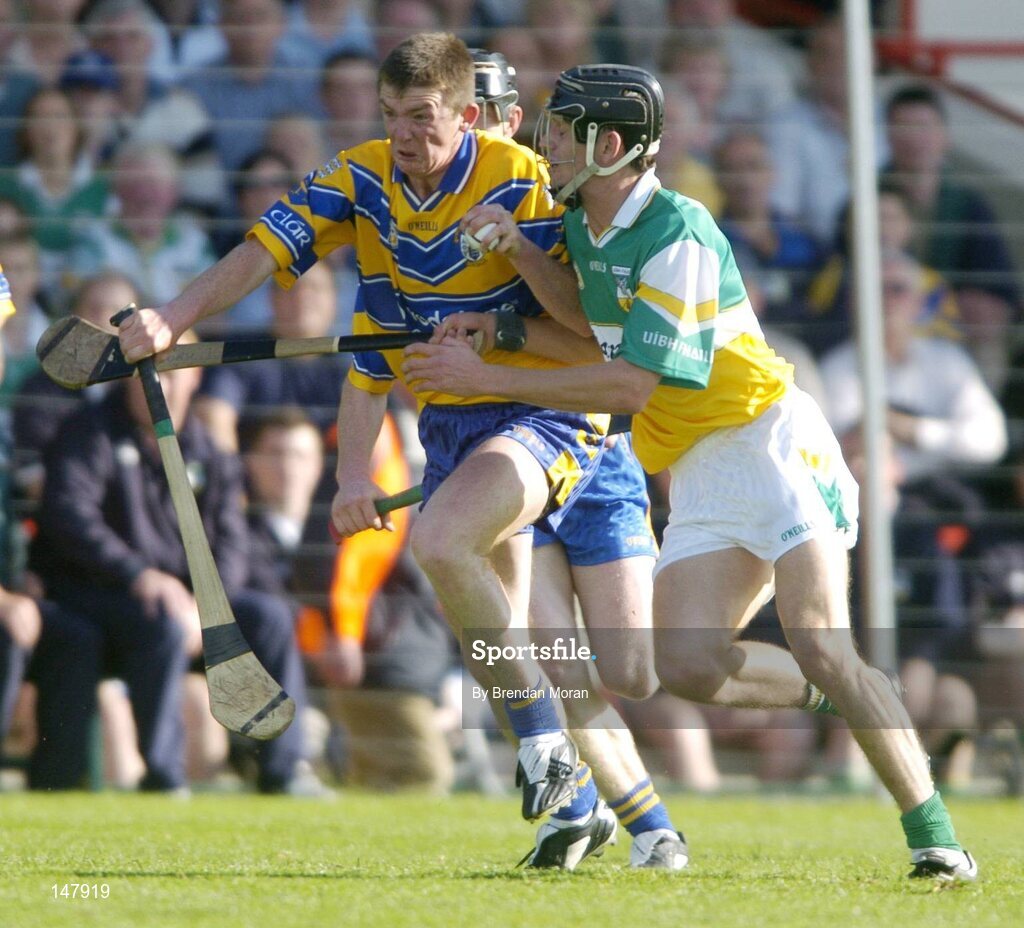 17 July 2004; Diarmuid McMahon, Clare, in action against Rory Hanniffy, Offaly. Guinness Senior Hurling Championship Qualifier, Round 3, Clare v Offaly, Gaelic Grounds, Limerick. Picture credit; Brendan Moran / SPORTSFILE