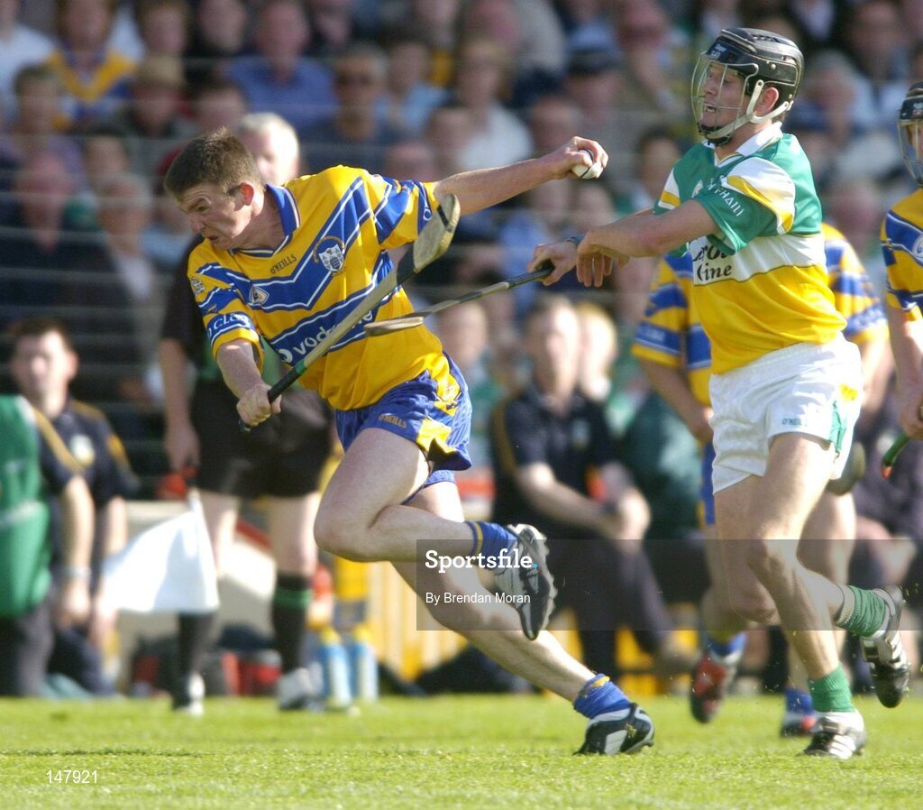 17 July 2004; Diarmuid McMahon, Clare, in action against Rory Hanniffy, Offaly. Guinness Senior Hurling Championship Qualifier, Round 3, Clare v Offaly, Gaelic Grounds, Limerick. Picture credit; Brendan Moran / SPORTSFILE