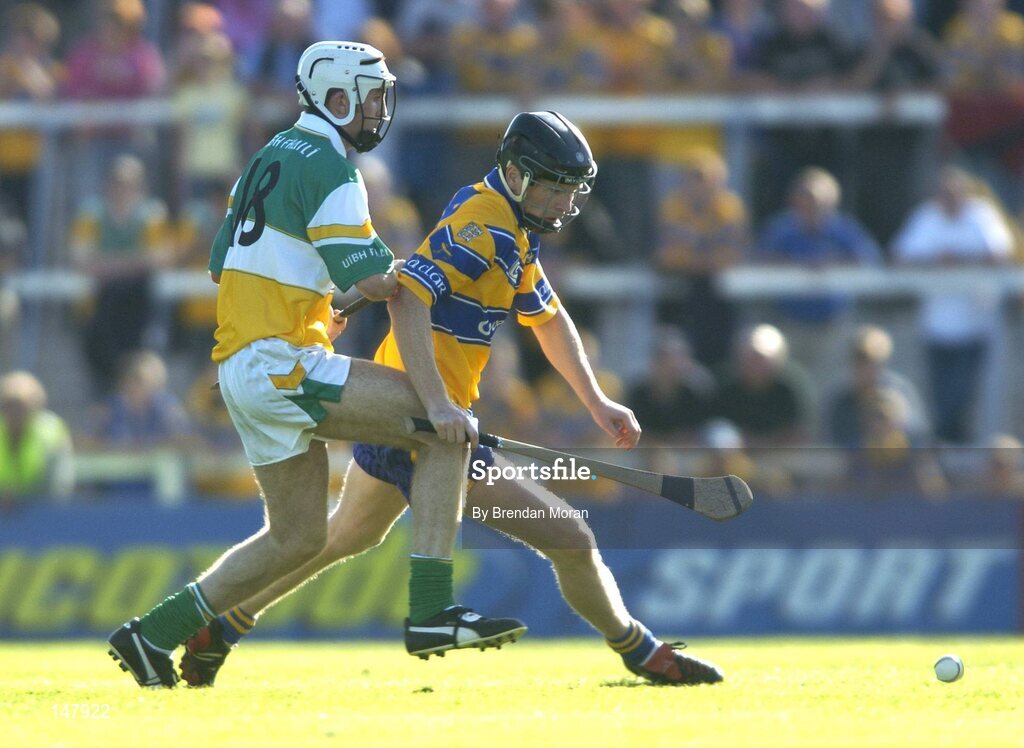 17 July 2004; Frank Lohan, Clare, in action against Kevin Brady, Offaly. Guinness Senior Hurling Championship Qualifier, Round 3, Clare v Offaly, Gaelic Grounds, Limerick. Picture credit; Brendan Moran / SPORTSFILE