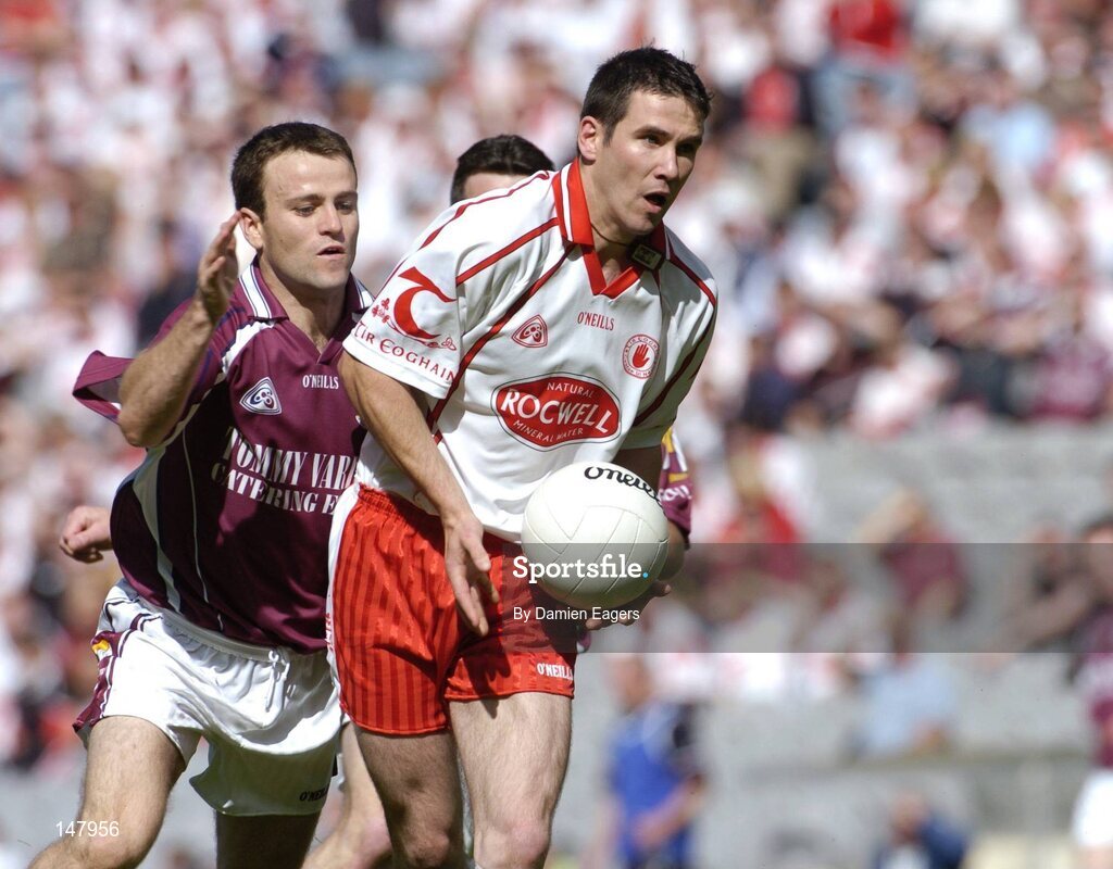 17 July 2004; Ciaran Gourley, Tyrone, in action against Derek Savage, Galway. Bank of Ireland Senior Football Championship Qualifier, Round 3, Tyrone v Galway, Croke Park, Dublin. Picture credit; Damien Eagers / SPORTSFILE