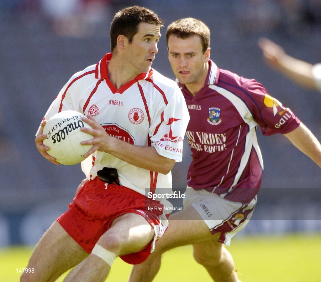 17 July 2004; Ciaran Gourley, Tyrone, in action against Derek Savage, Galway. Bank of Ireland Senior Football Championship Qualifier, Round 3, Tyrone v Galway, Croke Park, Dublin. Picture credit; Ray McManus / SPORTSFILE