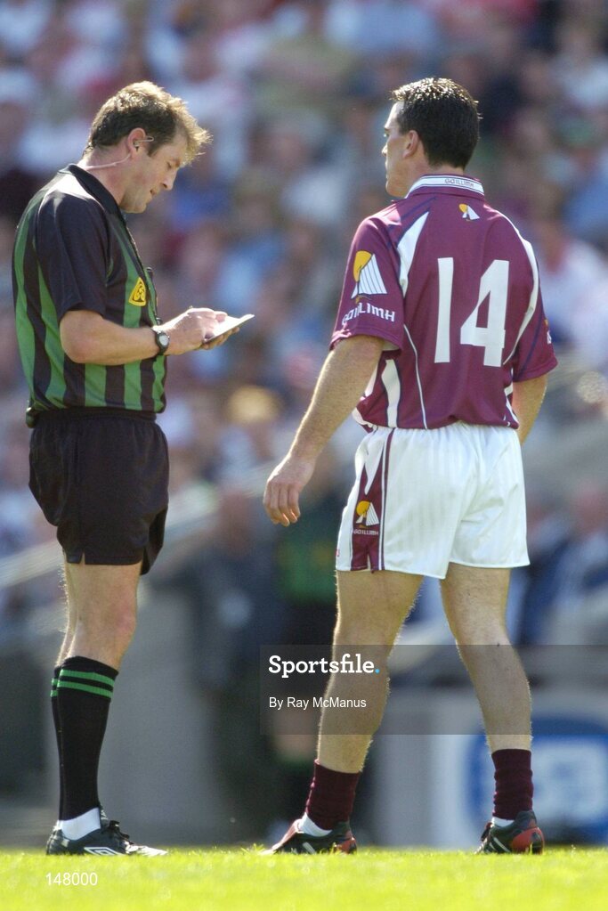 17 July 2004; Referee Michael Monahan takes the name of Galway's Pauric Joyce into his notebook. Bank of Ireland Senior Football Championship Qualifier, Round 3, Tyrone v Galway, Croke Park, Dublin. Picture credit; Ray McManus / SPORTSFILE