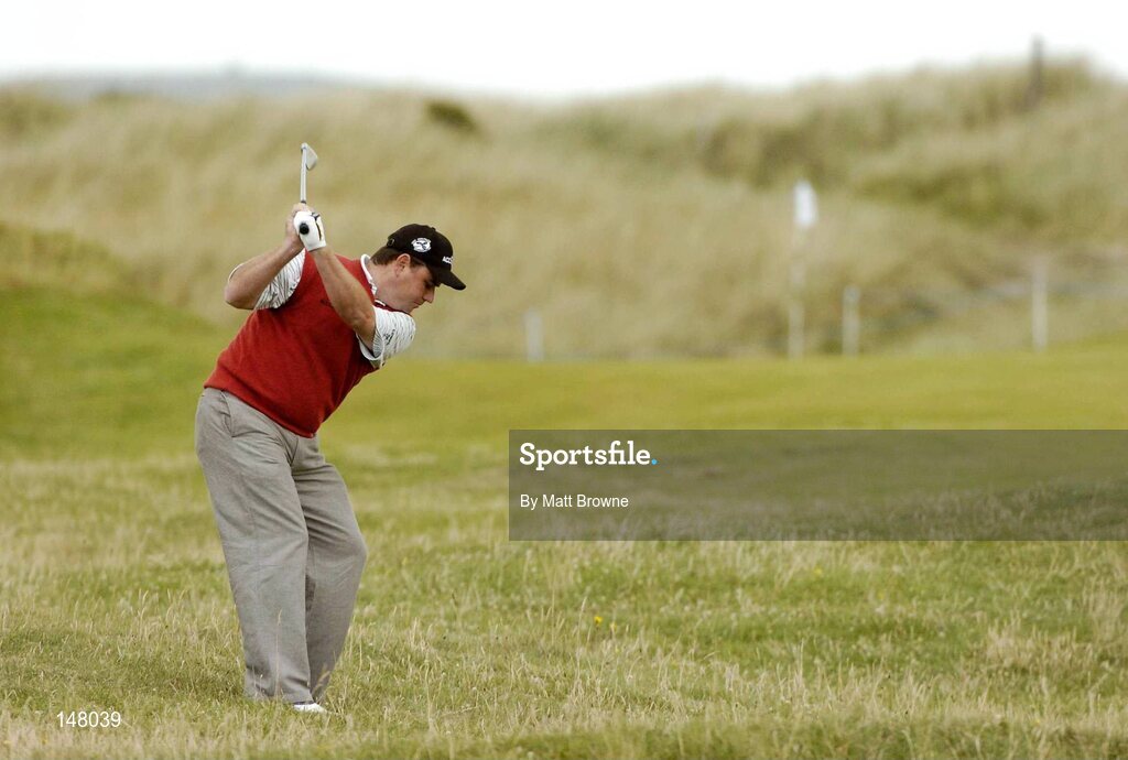 23 July 2004; Gary Murphy plays his second shot from the rough onto the 13th green during the second round. Nissan Irish Open Golf Championship, County Louth Golf Club, Baltray, Co. Louth. Picture credit; Matt Browne / SPORTSFILE