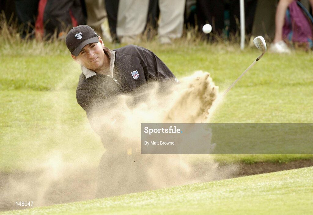 23 July 2004; Ben Curtis plays from the bunker onto the 18th green during the second round. Nissan Irish Open Golf Championship, County Louth Golf Club, Baltray, Co. Louth. Picture credit; Matt Browne / SPORTSFILE