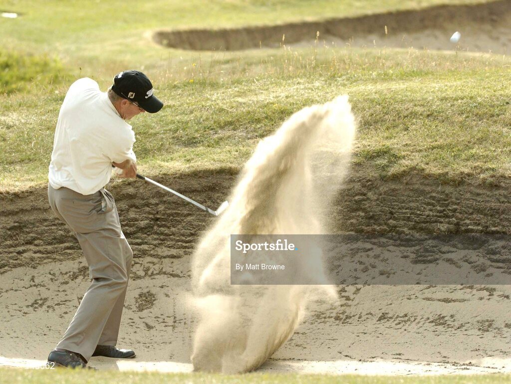 23 July 2004; James Kingston blasts from the bunker onto the 9th fairway during the second round. Nissan Irish Open Golf Championship, County Louth Golf Club, Baltray, Co. Louth. Picture credit; Matt Browne / SPORTSFILE