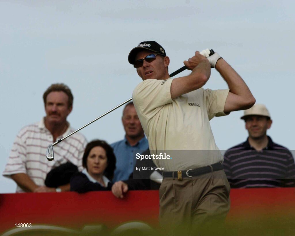 23 July 2004; James Kingston watches his drive from the 9th tee box during the second round. Nissan Irish Open Golf Championship, County Louth Golf Club, Baltray, Co. Louth. Picture credit; Matt Browne / SPORTSFILE