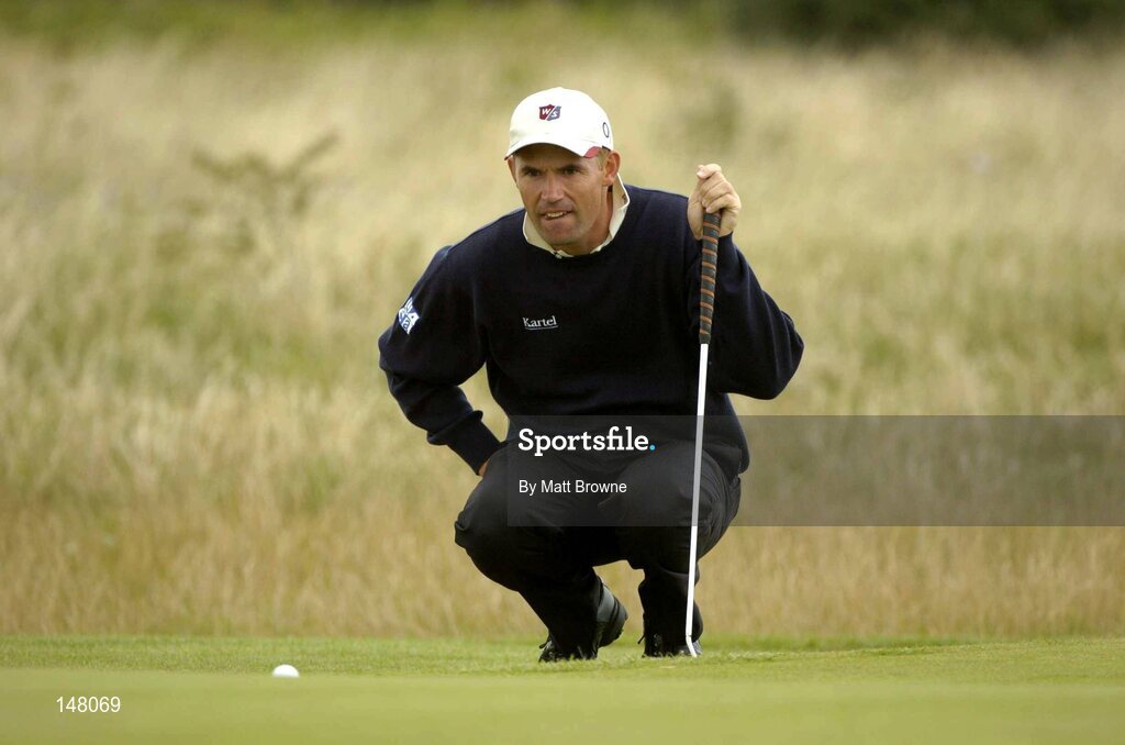 23 July 2004; Padraig Harrington lines up a putt on the 16th green during the second round. Nissan Irish Open Golf Championship, County Louth Golf Club, Baltray, Co. Louth. Picture credit; Matt Browne / SPORTSFILE
