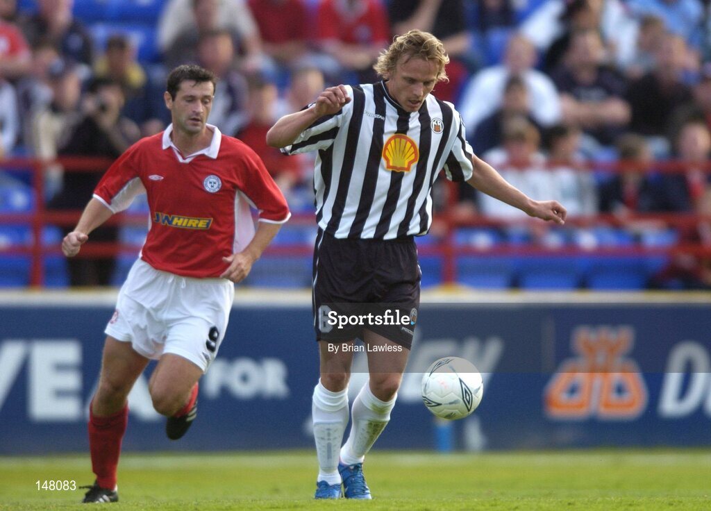 21 July 2004; Kristian Orn Sigurdsson, KR Reykjavik, in action against Alan Moore, Shelbourne. UEFA Champions League 1st Qualifying Round, Second Leg, Shelbourne v KR Reykjavik, Tolka Park, Dublin. Picture credit; Brian Lawless / SPORTSFILE