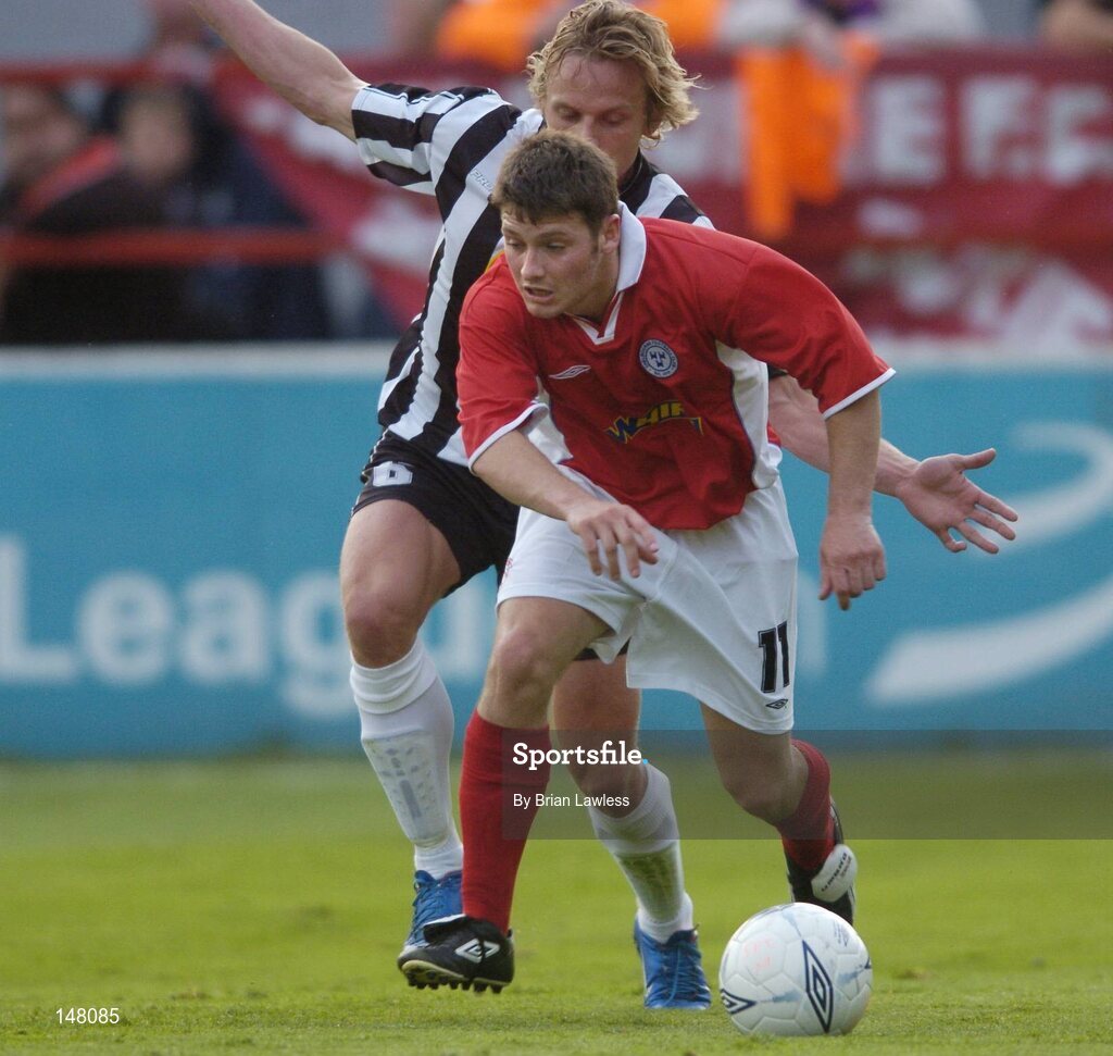 21 July 2004; Wesley Hoolihan, Shelbourne, in action against Kristian Orn Sigurdsson, KR Reykjavik. UEFA Champions League 1st Qualifying Round, Second Leg, Shelbourne v KR Reykjavik, Tolka Park, Dublin. Picture credit; Brian Lawless / SPORTSFILE