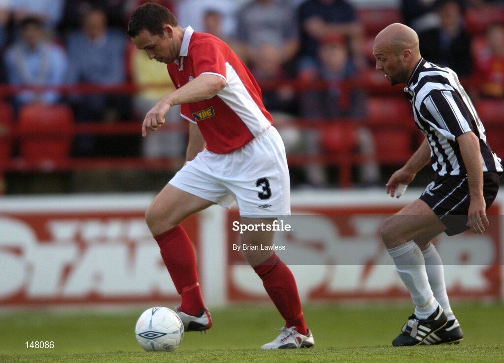 21 July 2004; David Crawley, Shelbourne, in action against Arnar Gunnlaugsson, KR Reykjavik. UEFA Champions League 1st Qualifying Round, Second Leg, Shelbourne v KR Reykjavik, Tolka Park, Dublin. Picture credit; Brian Lawless / SPORTSFILE