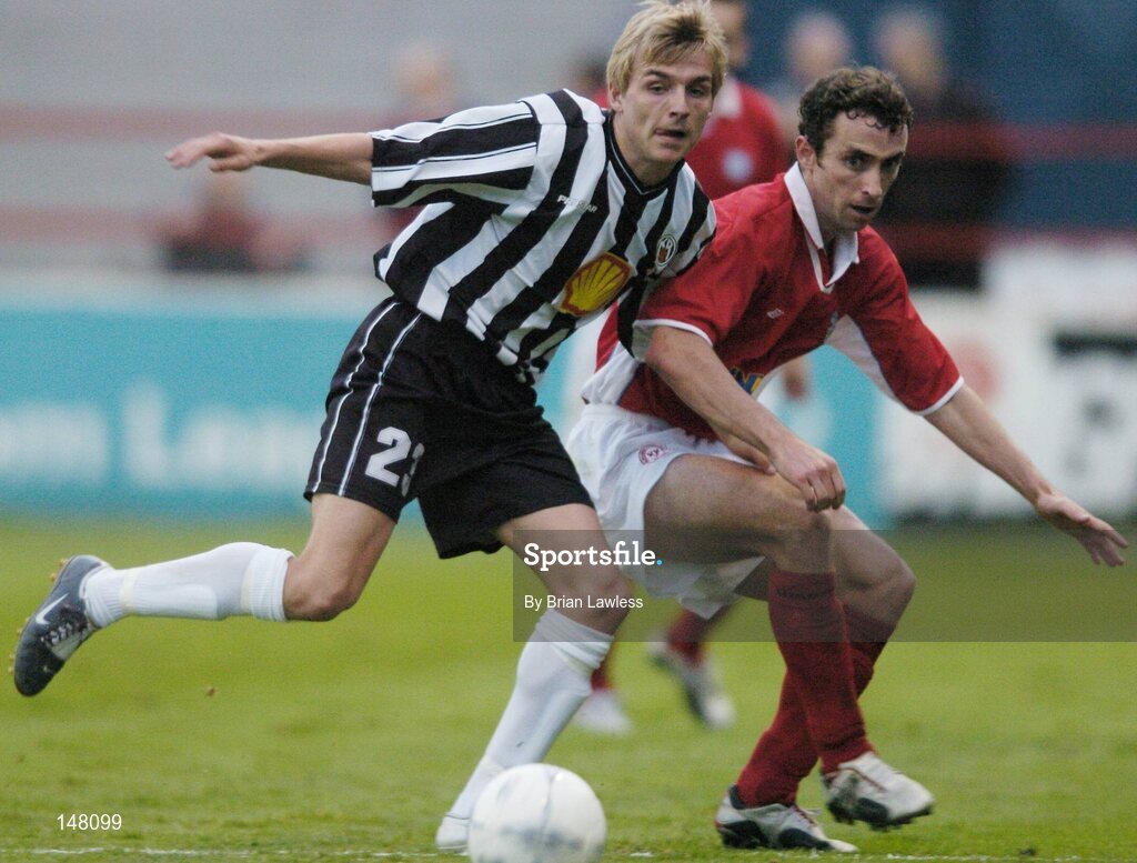 21 July 2004; Ollie Cahill, Shelbourne, in action against Jokull Elisarbetarson, KR Reykjavik. UEFA Champions League 1st Qualifying Round, Second Leg, Shelbourne v KR Reykjavik, Tolka Park, Dublin. Picture credit; Brian Lawless / SPORTSFILE