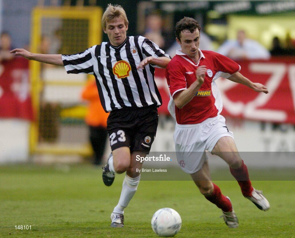 21 July 2004; Ollie Cahill, Shelbourne, in action against Jokull Elisarbetarson, KR Reykjavik. UEFA Champions League 1st Qualifying Round, Second Leg, Shelbourne v KR Reykjavik, Tolka Park, Dublin. Picture credit; Brian Lawless / SPORTSFILE