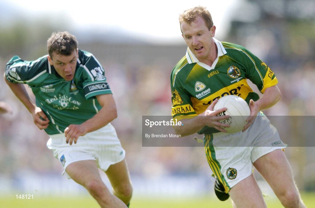 18 July 2004; Liam Hassett, Kerry, in action against Mike O'Brien, Limerick. Bank of Ireland Munster Senior Football Championship Final Replay, Kerry v Limerick, Fitzgerald Stadium, Killarney, Co. Kerry. Picture credit; Brendan Moran / SPORTSFILE