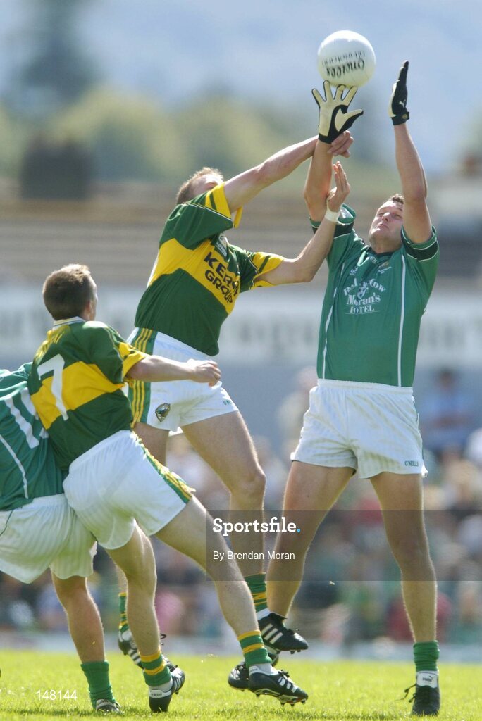 18 July 2004; Jason Stokes, Limerick, in action against Tommy Griffin, Kerry. Bank of Ireland Munster Senior Football Championship Final Replay, Kerry v Limerick, Fitzgerald Stadium, Killarney, Co. Kerry. Picture credit; Brendan Moran / SPORTSFILE