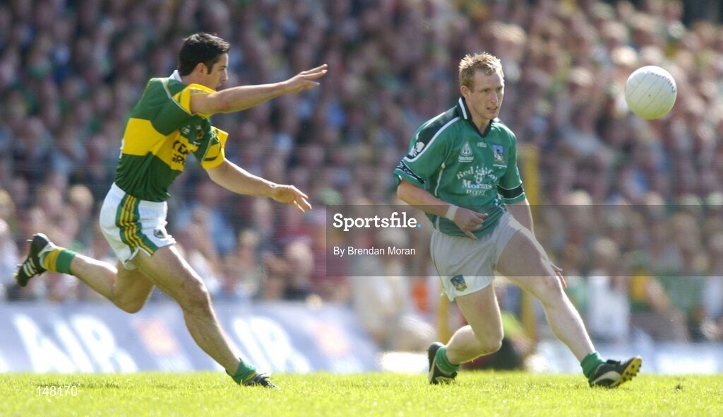 18 July 2004; Stephen Kelly, Limerick, in action against Aidan O'Mahony, Kerry. Bank of Ireland Munster Senior Football Championship Final Replay, Kerry v Limerick, Fitzgerald Stadium, Killarney, Co. Kerry. Picture credit; Brendan Moran / SPORTSFILE