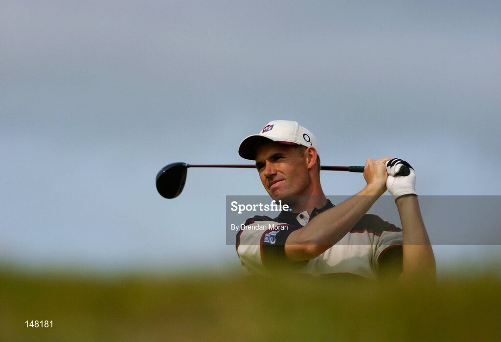 21 July 2004; Padraig Harrington watches his drive at the 4th tee box. Nissan Irish Open Pro Am, County Louth Golf Club, Baltray, Co. Louth. Picture credit; Brendan Moran / SPORTSFILE